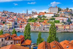 Porto, Portugal old town skyline from across the Douro River.Po